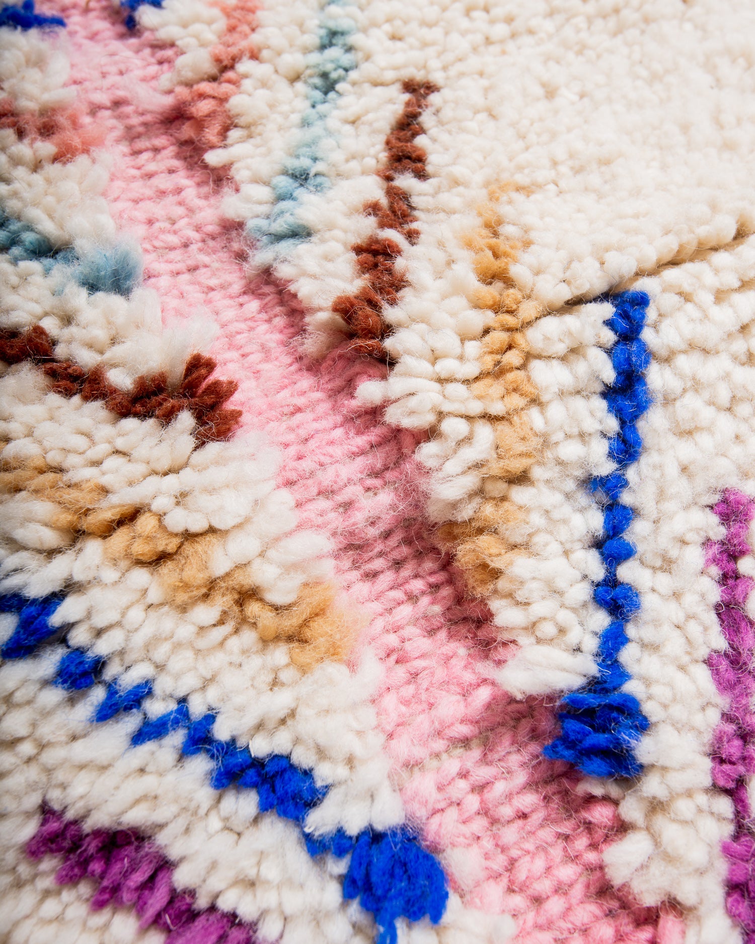 Modern, designer, handcrafted Berber rug from Morocco. Beniourain carpet with beautiful colours and patterns and fluffy wool texture.